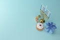 3d rendering Image of Jewish holiday Hanukkah with menorah or traditional Candelabra,gif box, jar ,gold coin and wooden dreidels Royalty Free Stock Photo