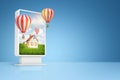 3d rendering of information display with house in green field on screen with striped hot-air balloons flying out, with