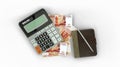 3D rendering of an isolated composition of Russian Ruble notes, a calculator, a note book and a pen Royalty Free Stock Photo