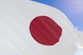 3D rendering of Japan flag waving on blue sky background Royalty Free Stock Photo