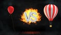 3d rendering of a large flaming word VS stands between a red party balloon and a striped hot air balloon with a basket.