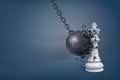 3d rendering of a large wrecking ball breaks in small pieces when it hits a white chess king. Royalty Free Stock Photo