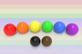 3d rendering. lgbt rainbow color style sphere with black and brown balls on flag background. welcome new sign to pride community