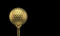 3d rendering. Luxurious Golden golf ball on tee prize with clipping path isolated on black background