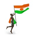 Man holding Niger Flag