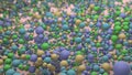 3D rendering of many colored spheres of different sizes located in the plane and forming an abstract background. A large pink