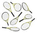 3d rendering many identical tennis racquets hanging at different angles on white background.