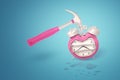 3d rendering of a metal hammer with a pink handle crashing a pink alarm clock on a blue background.