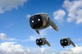 Military robot with camouflage skin flying in sky