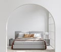 minimal style bedroom with white wall ,wooden floor,big window ,empty wall for copy space,mockup frame