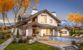 3d rendering of modern house in evening autumn Royalty Free Stock Photo