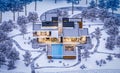 3d rendering of modern house by the river in winter night Royalty Free Stock Photo