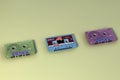 3d rendering Old audio tape compact cassette isolated on yellow background Retro cassette tape collection top view