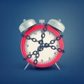 3d rendering of an old-fashioned alarm clock enchained in shackles on blue background.