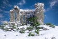 3D rendering of an old ruined medieval castle on a hill in a sno