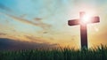 3D Rendering of old wooden cross on grass hill with dramatic ray lights from sky. Concept of Jesus Christ cross, Easter Royalty Free Stock Photo