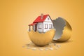 3d rendering of one-storeyed house in half of gold eggshell with the other eggshell lying behind on ocher background.