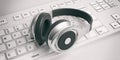 3d rendering pair of wireless headphones on a keyboard Royalty Free Stock Photo