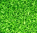 3D rendering of pile of green candy gums