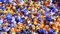 A pile of purple and yellow lego bricks. 3d rendering