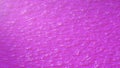 3D rendering. Pink liquid background. Pink texture with pores and uneven surface.