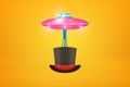 3d rendering of pink UFO carrying black tophat with red ribbon below it on amber background. Royalty Free Stock Photo