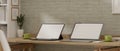 3D rendering, portable workspace with two laptops and decorations on wooden table