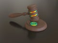 3D rendering - rainbow colored bitcoin under a gavel