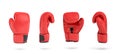 3d rendering of a red right boxing glove in four different angle views.