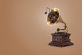 3D Rendering Retro Golden Gramophone With Music Notes On Brown Isolated Background
