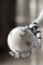 3D rendering. Robot hand holding a globe. The concept of robotization of the world, advanced technologies. Banner
