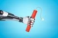 3d rendering of robotic hand holding red TNT dynamite stick on blue background