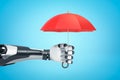 3d rendering of robotic hand holding red umbrella on blue background