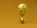 3d rendering a rock above an egg in balance on a orange background, a sculpture of gold Royalty Free Stock Photo