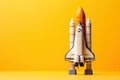 3D rendering of a rocket isolated against a studio background, offering ample copy space for text and messages. Royalty Free Stock Photo