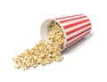 3d rendering of a round striped popcorn bucket lying on its side with popcorn spilling out of it.