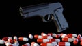 3d rendering of drugs capsule and gun