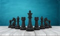 3d rendering of a set of black chess figurines standing on a wooden table.