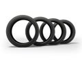 3D rendering set of four tires for car on white background with shadow
