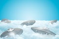 3d rendering of set of UFOs on thick layer of white fluffy clouds with blue sky above.