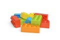 3d rendering of several colorful LEGO bricks lying on white background.