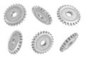 3d rendering of several metal spur gears hanging in different angles on a white background. Royalty Free Stock Photo