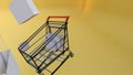 3d rendering, shopping cart yellow background, copy space, shopping and shopping bags Royalty Free Stock Photo