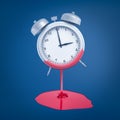 3d rendering of silver alarm clock with pink paint melting off on blue background Royalty Free Stock Photo