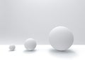 3d rendering. simple white small to big sphere ball object on gray background. growing up or evolution concept.