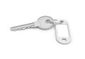 3d rendering of a single silver key with label isolated on white background