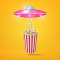 3d rendering of small pink UFO flying above striped popcorn bucket and drawing some popcorn toward its hatch on amber