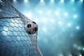 3d rendering soccer ball in goal. Soccer ball in net with spotlight and stadium light background, Success concept