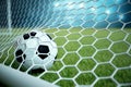 3d rendering soccer ball in goal. Soccer ball in net with spotlight and stadium light background, Success concept