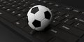3d rendering soccer ball on a keyboard